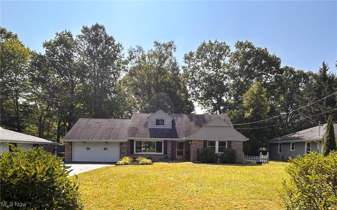 Don't miss out on this 4 bedroom, 3 bath house in Boardman School District near beautiful Mill Creek Park. Featuring hardwood floor throughout, 2 fireplaces, newer furnace, a/c, hot water tank, roof, gutters and siding. This house needs nothing but your personalized updating inside to bring it to its full potential. Plenty of storage space in the basement, upstairs attic and attic in garage. The house comes with a one-year home warranty for a worry-free purchase. A surveillance system is also included.