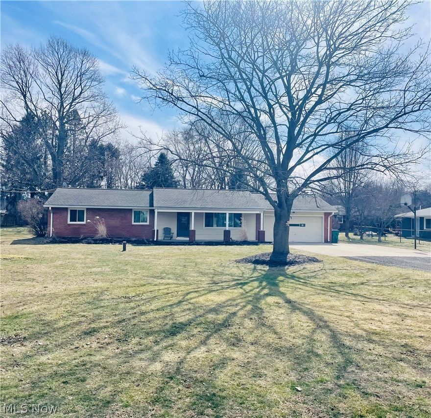 Move right in and enjoy easy peasy, one floor living. Newer vinyl flooring and carpet in bedrooms.  Most rooms freshly painted.  Kitchen is crisp and white, ready for your paint selections.  Big ticket items are updated and a home warranty is included for next owner.  HVAC one year young, as is the tankless HW system.  New panel and updated, rewired.  Garage furnace is here but needs a gas line run piece/component.    Inside:   3 spacious bedrooms.  Large living room off the front porch.    Dedicated dining room area and spacious, galley kitchen leading to the garage which has a workbench that will remain.  Fully fenced back yard and shed.   Gardens existing!  Bathroom with brand new, new walk in shower.  Laundry room/mudd room from back yard plus a door off garage.  Brand new dryer (not in pics but you will see)  Close proximity to the Perry schools complex and community athletic center, senior center, Lake Erie and commuting ease to Route 2 or I90.   Extra parking pad area for your boat, RV/camper or other vehicles.