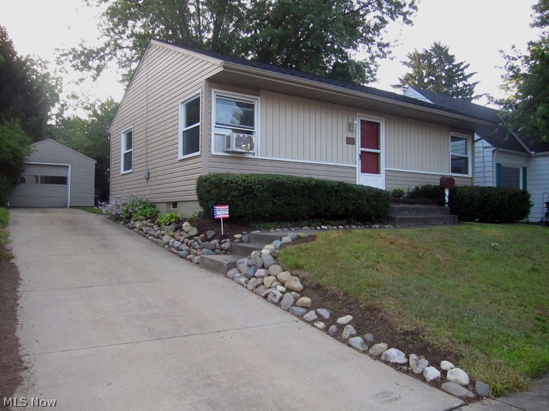 Step into this updated ranch an find that there's nothing to do here! Maintenance free aluminum siding, vinyl replacement windows, entire interior completely & professionally repainted in fashionable neutral colors. Seller had beautiful hardwood floors refinished in a current dark stained finish just this year. Kitchen & dining room are ceramic tile flooring, counters just replaced, full unfinished basement was previously waterproofed and has a sump pump. Electrical service & panel newly updated. The professionally landscaped back yard will transform into a seasonal retreat. Why rent when you can purchase this home with as little as 3.5% down and have a monthly payment approximately $725.00 per month. Plus enjoy Cuyahoga Falls Utilities & amenities.