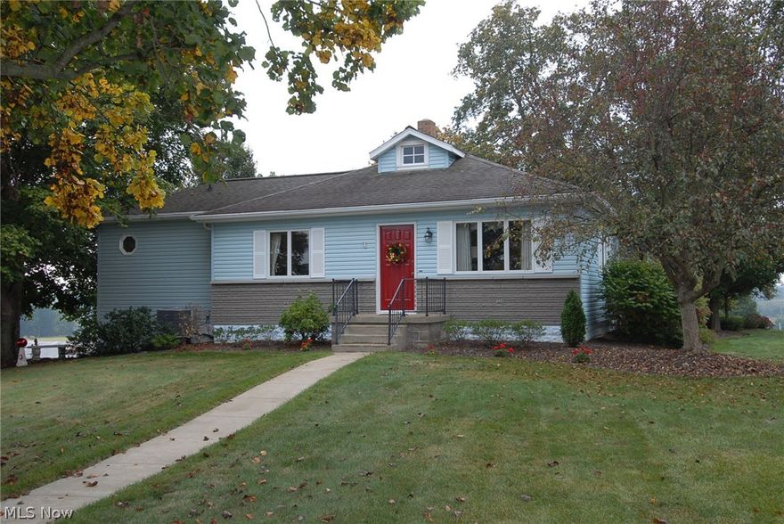 This one is a fooler...can't just drive by !  Very well maintained Home with Spacious rooms, and  beautiful Views off private back deck.
Home offers eat in kitchen, with New flooring and updated cabinets/countertops, Family room with brick fireplace, formal dining room, large living room, master bedroom/bath, two guest rooms and another full bath on main level.   Lower level offers laundry room, workout center, Sauna Room with HotTub that offers beautiful views of the outdoors.   TONS of storage in this home!  Bus Stop right in front of house  for East Muskingum Schools!   Convenient for Zanesville/Columbus/New concord/Cambridge commuters (2 min. to I70) Home also offers Wood Burner that could heat entire home !