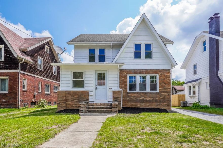 Prepare to fall in love with this beautifully updated West Akron colonial! Recent improvements include new exterior doors, electric panel, furnace, A/C, hot water tank, most windows, and a new roof on the detached two car garage. The enclosed porch offers a perfect spot for coats and shoes, leading you into the living room with a cozy fireplace surrounded by bookcases. New luxury vinyl plank flooring continues into the bright and airy dining room accented by crown molding.

The remodeled kitchen boasts modern farmhouse style with butcher block countertops, tile backsplash, stainless steel appliances, and a charming breakfast nook. A convenient half bath completes the main level. Upstairs, find three bedrooms, including the primary with an arched dormer, built-in drawers, and a renovated full bath featuring beadboard paneling and a tub with a tile shower surround. The finished attic provides a fourth bedroom and a tandem bonus room, ideal for an office or playroom.

Outside, enjoy the fully fenced backyard, perfect for kids and pets to play and a fantastic location close to all amenities. Don’t miss out on this wonderful West Akron home, call today!