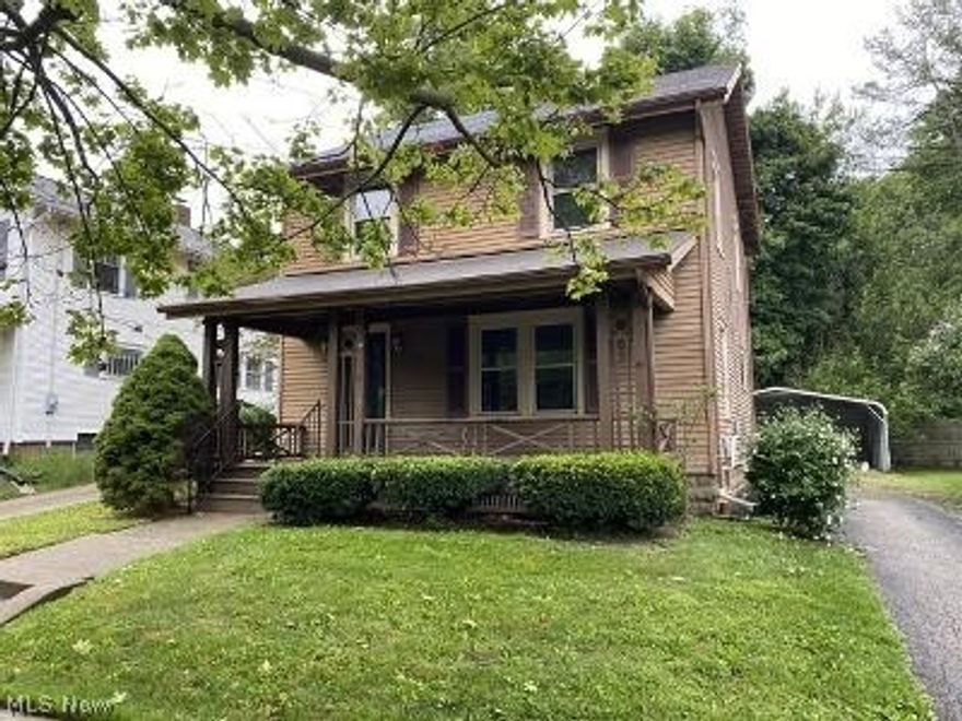 Older home with character features good sized, wood paneled kitchen, dining room, spacious living room with brick fireplace, 3 bedrooms, 2 full baths, full basement and 2 car detached carport.