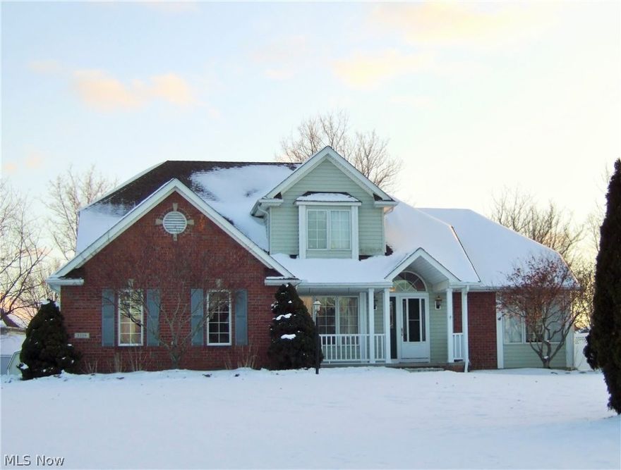 As you enter this 2 story home with open floor plan, you will be amazed at how much room there is! The vaulted Great Room has a cozy fireplace to keep you warm during the Cleveland winter! Enjoy entertaining in your Formal Dining Room or Eat In Kitchen which offers ample counter space with breakfast bar, oak cabinets with updated hardware and fixtures, pantry and newer (2010/2015) stainless steel kitchen appliances that are all included! The sliding door opens to a wonderful 3 Season Sun Room with gorgeous views of your almost 3/4 acre manicured yard & shed. The driveway offers plenty of parking space for family and guests.  The 1st floor Owner's-Suite has beautiful hardwood floors and private bath. You'll love the corner soaking tub, double sinks, brushed nickel hardware, updated mirrors, and walk in closet. On the 2nd level you will find 3 Bedrooms, 2nd Full Bath and Walk-In Attic (use for storage or could be finished into 5th bdrm). The Basement is a huge selling point!! 3 large Fin