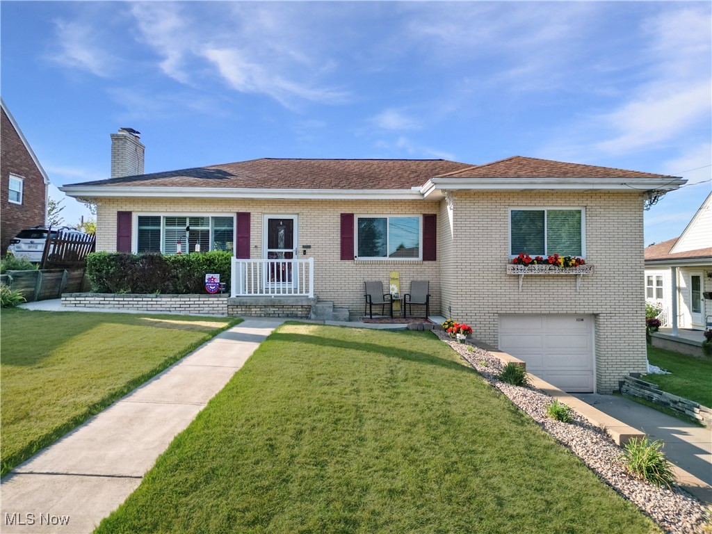 Welcome to this beautifully updated 3-bedroom, 2 full bath solid brick ranch, ideally located in a desirable neighborhood close to many local amenities.
Step inside to a spacious living room filled with natural light, featuring a cozy fireplace as the focal point and brand-new shutters accenting the windows. The open flow leads into the large custom eat-in kitchen, complete with a peninsula breakfast bar, quartz countertops, soft-close cabinets, and all new appliances. Sliding doors off the kitchen open to a covered back porch overlooking a large, flat yard—perfect for relaxing or entertaining.
The main level offers three generously sized bedrooms and an updated full bathroom, along with new flooring throughout. The finished basement expands your living space with a large rec room equipped with surround sound, a second full bathroom, and plenty of room for gatherings or a game area.
Recent updates add both style and peace of mind, including: a new 200-amp electric panel, professionally waterproofed basement with interior drains and a sump pump, new retaining wall along the driveway, and new concrete sidewalks.
This move-in ready home combines modern updates with lasting quality—schedule your private showing today!