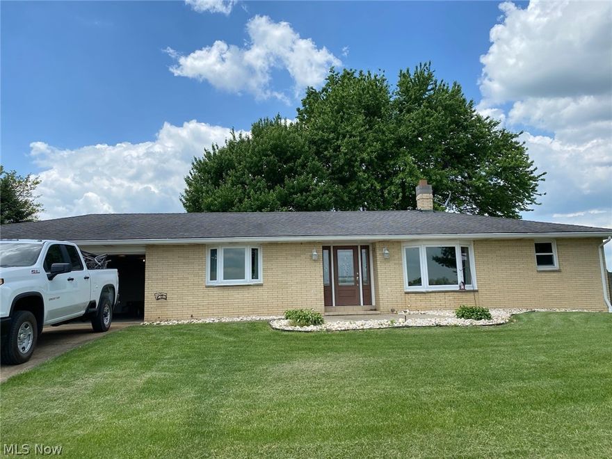 Just Listed this super clean 2-3 bedroom solid brick ranch on almost an acre of land.  You will love the ability to move right in, as it is crisp and clean with new flooring throughout.  The main level features two large bedrooms, large open concept kitchen and dining area, and a beautiful bay window to enjoy the views. Downstairs is a possible 3rd bedroom and a lovely new full bath.  Laundry area with washer and dryer included.  Woodburning stove stays in the basement and provides a wonderful extra source of heat. 2 car attached garage.  Newer roof. Nice private setting!  Call today for a first look at this one!