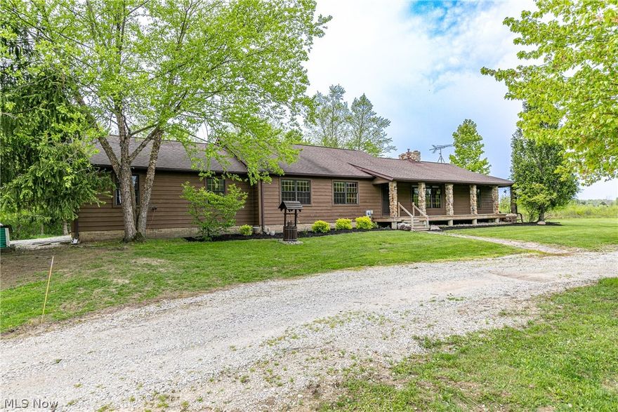 Welcome to 17555 Gar Hwy with a beautiful 3 Bedroom ranch home nestled on 63 acres of land! Three ponds, a lake with a stream, horse barn w/tack room, loft, water & electricity & a front pole barn that has two office space also with water, electricity & dual sides large garage doors for equipment in the storage area. Just click on the video tour to see the aerial video tour of the property! The moment you pull up to this charming home you are welcomed by the spacious front porch.  The second you open the door you are greeted by gleaming hardwood floors and a vaulted ceiling living room that is centered around the stone hearth pellet fireplace.  A View of nature out of every window.  The kitchen has lots of storage, a center island and all the appliances stay. Master bedroom & bath boast a large walk-in closet, jacuzzi tub and dual vanities. Spacious bedrooms! Full basement has a wood burning fireplace and has walk out steps to the two-car attached garage. Back deck for entertaining!