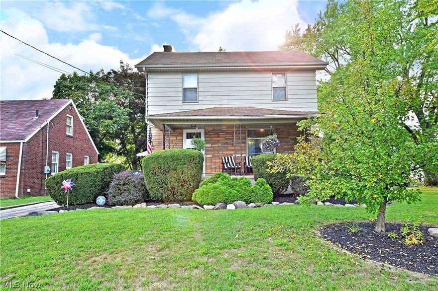 Hurry in, this perfectly charming three-bedroom Youngstown home won’t last long! With two and a half floors of finished living space to include a basement level bonus room and second full bath, this residence checks all the right boxes. Manicured landscaping runs beneath the tall trees as a covered front patio provides plenty of curb appeal along with warm weather relaxation. The concrete drive stretches back to a detached single car garage with a bonus storage shed. Step inside the front door to find a welcoming foyer as the thick, stained woodwork continues up the carpeted staircase. A lavish family room opens nearby to highlight a quartet of unique windows and brightly colored walls and carpet. A home office and delightful half bath sprawl around the far end of the room. Meanwhile, the impressive central kitchen brings additional bar top seating as it reveals a large dining area. Upstairs, a trio of spacious bedrooms include an oversized master. A second full bath completes the floo
