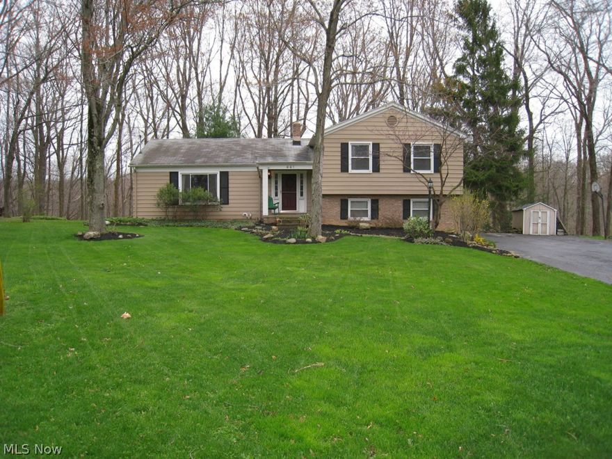 Gorgeous split with 4 finished levels on a private cul-de-sac lot overlooking the woods! Large living and dining. Bright and clean kitchen with eating area. Spacious family room opens to the back patio and pretty lot. Finished rec room in lower level. Nice master suite with his and hers closets and updated master bath. Hardwood floors. Updated windows in 2005, new furnace in 2014, updated baths and so much more!
