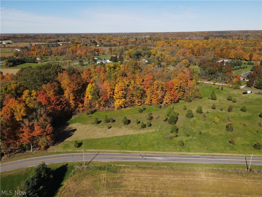 10.23 Acres which you could put into CAUV for a tax reduction. This land is mostly cleared with more woods than the pictures make it out to be. There's a running creek in the woods on the property. There's public water on Shaw Rd that can be tapped into. This would be a great property to build a home or multiple homes on.