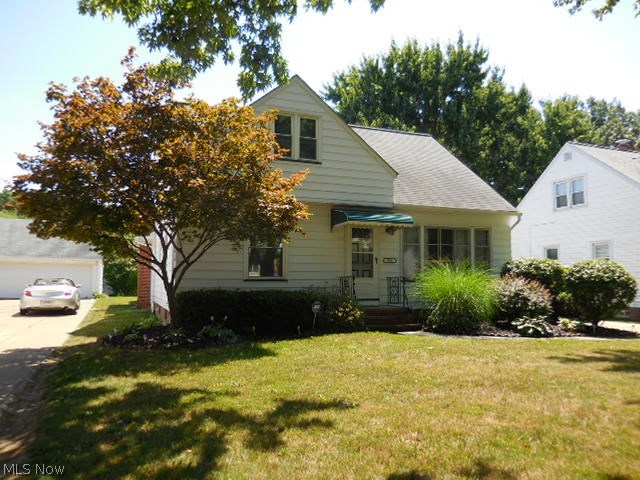 This spacious 3 Bedroom and 3 Bath Bungalow Features a First Floor Family Room with Fireplace and built in bookshelves, and an eating area. Sliders lead to a 2 tier Deck and deep back yard! Located on a beautiful tree lined street, this home welcomes you with an updated kitchen, hard wood floors and the convenience of a bathroom on every level! The upstairs Master Bedroom has built in dressers as well as attic storage and cedar closet. The finished lower level has a large RecRoom, laundry area and newer full bath with sparkling tiled shower. All appliances are included - Kitchen and Washer and Dryer! Other features include newer furnace and central air, replacement windows in the bedrooms, and glass block in the lower level. The 2 car garage has an extra storage room at the back to hold all of your outdoor tools and equipment. It is violation free!! This extremely clean and well kept home is just waiting for a new family to move right in!! Call for a showing today!