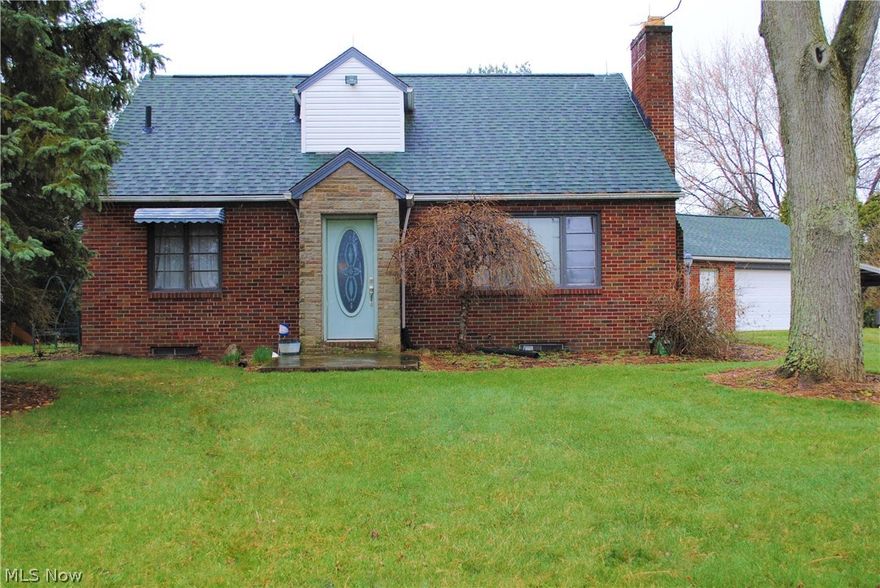 Welcome home to this beautiful Cape Cod located in North Canton Ohio within Jackson Local School District.  Situated on a large lot of 1.4 acres of land.  Walk in the back door, through the mud room, into a large eat in kitchen. Kitchen has a cook top and a built in double wall oven, plenty of cabinet space, counter space, great for entertaining family and friends.  Not to mention a trash chute that goes into the basement  Go into the living room and the fireplace is gas or wood, with an ash cleanout that goes into the basement, and blower fans to quickly heat the room.  Master bedroom on the main floor next to the half bathroom.  The additional living area could make a wonderful home office or add a closet to make it an additional bedroom.  Upstairs you will find two bedrooms and the full bathroom.  This bathroom has an oversized tub.  One of a kind natural hardwood throughout the home, sourced from the property when it was originally constructed.  Laundry room was added in the baseme