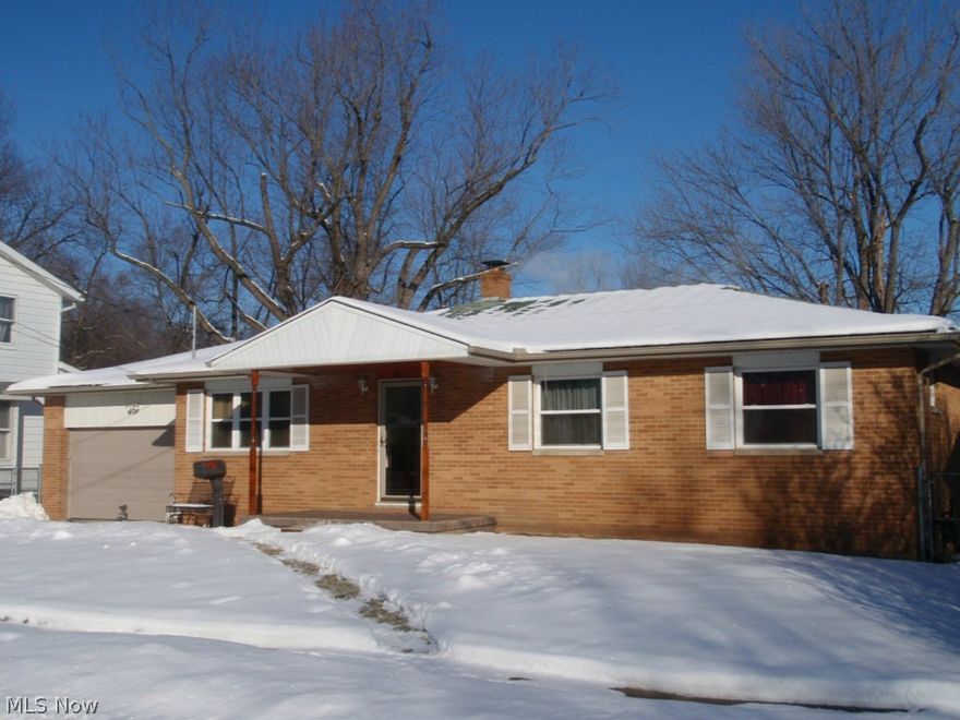 Quality all Brick Ranch on Wide Lot;  Features Oversized 2 Car Attached Garage, Covered Porch off Dining Room, 1/2 Bath in Master Bedroom, Huge Finished Basement (Bedroom, Rec Room, Bath), Hardwood throughout!  Updates include Roof '04, New Electric Service '12, New Windows, Slider and Front Door & H2O tank '13, Furnace, Glass Block, Gutters & New Garage Door '14, Shed '10.