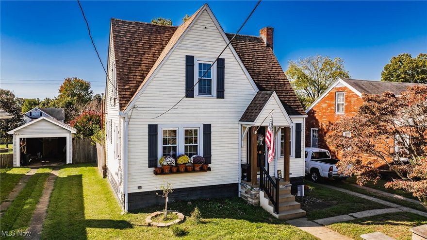 This charming Cape Cod home is nestled in the heart of Vienna, West Virginia. The first floor welcomes you with a cozy living room and a spacious eat-in kitchen, complete with an island for extra prep space. Just a few steps down, you’ll find a bright morning room, a convenient laundry area, and a full bathroom featuring a walk-in shower. The second floor boasts two hardwood-floored bedrooms and an updated full bath, beautifully remodeled by Bath Fitters. The finished basement provides additional living space, including a large carpeted family room and a half bath. Outside, the fully enclosed backyard offers a perfect setting for relaxation, complete with a fire pit and pergola for evening enjoyment. A detached one-vehicle garage provides additional convenience and storage.