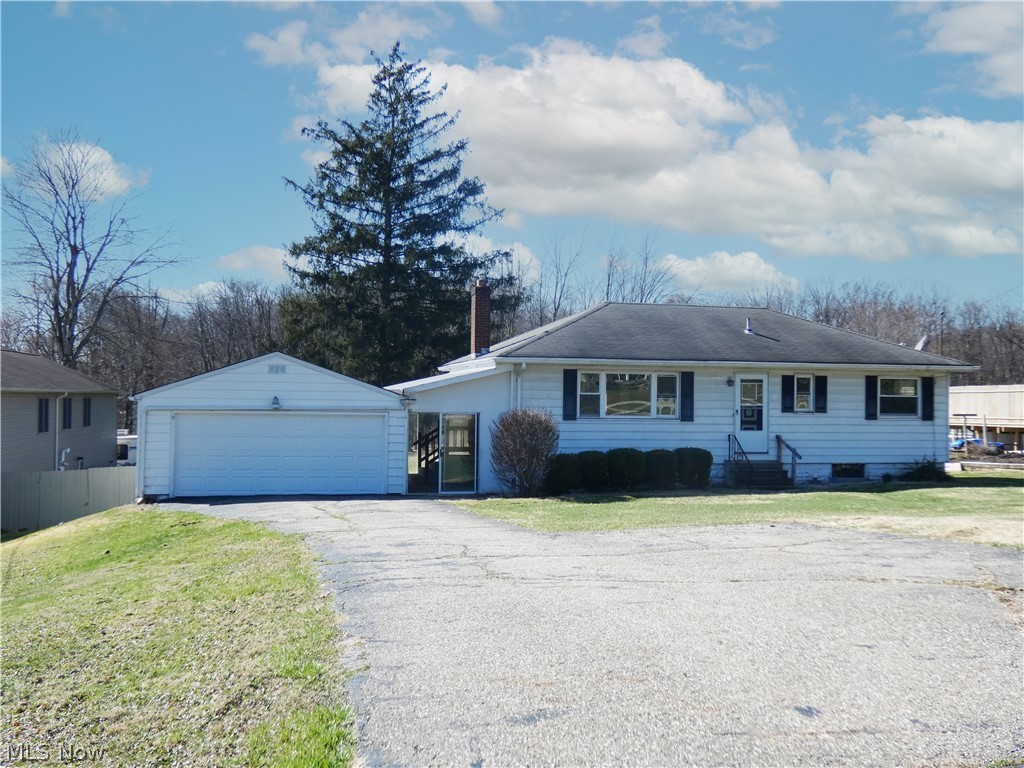 3BD/1BA single-level ranch home in Tallmadge on a FABULOUS and large 1.25+ acre deep and PRIVATE wooded lot that backs to absolutely nothing! Living Room and all bedrooms boast original hardwood floors throughout. Eat-in kitchen has plentiful cabinet space and comes with all appliances. Large full basement provides ample storage space and has potential to be finished for additional living space. Convenient large breezeway connects to the 2-car garage with newer garage door (2022) and could be used as additional outdoor living space and patio provides a cozy spot to enjoy the view of the large yard. Nice sized shed for storing all of your tools. Recent updates include H2O Tank and Well Pump (2018), Furnace, re-drilled Well and updated water system (since 2017). Great Tallmadge location near Cascades shopping, Route 76 and Tallmadge Circle. Come see today! Home is being sold strictly AS-IS. Seller will make no repairs.