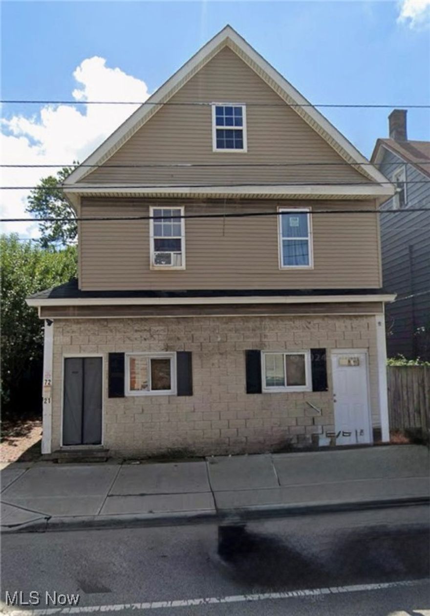 4 unit building under renovation. being used as 2 store fronts, studio apartment in the back and a 3 bedroom apartments upstairs. could be a good money maker for a smart investor!!