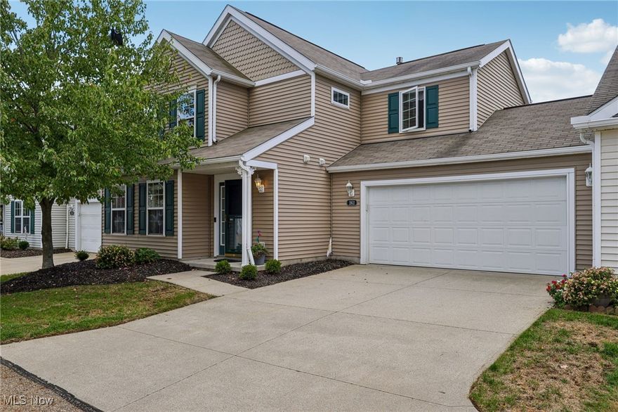 If you are looking for low-maintenance living near Portage Lakes, you won't want to miss this beautiful condo. This 3 bedroom, 2.5 bath condo is light, bright, and features an open first-floor floor plan. You will be greeted by the entryway with a conveniently located half bath. The spacious living room features large front windows that let in plenty of natural light. The open kitchen has plenty of counter space, a gas stove, pantry, and an updated ceramic and glass tile backsplash and a bar height counter overlooking the dining area creates an open layout that can also be set up with stools for a breakfast area. The laundry area with utility sink exits into the two-car garage. Upstairs, you'll find a primary suite with vaulted ceilings, a walk-in closet, and a large en-suite master bathroom featuring a walk-in shower. The other full bathroom and 2 additional bedrooms complete the second story. As you walk through this condo, take notice of all the closet space. There is a spot for everything you need to store away. A sliding glass door on the back of this condo leads out to a sunny concrete patio, perfect for outdoor dining, even on the sunniest days with the retractable SunSetter awning.  Call your Realtor to check it out with your own eyes.  **Listing agent is related to the seller.**