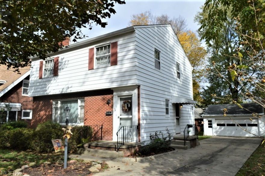 Well maintained Highland Square colonial offers a large living room with fireplace, formal dining room, an eat-n kithchen with updated countertops, electric stovetop range and built in oven.  A half bath is right inside the side door on the way down to the full basement.  Half of the basement is finished into a nice rec room with knotty pine paneling and a 2nd fireplace.  The other half of the basement features the laundry room, 2nd half bath and a newer furnace.  The 2nd floor offers three nice bedrooms- all with nice condition hardwood floors and a full bath.   Enjoy the nice size back yard, close proximatey to all the amenities HIghland Square has to offer and just minutes from downtown.   Owner says there are hardwood floors under the carpeting on first floor and in bedrooms that have carpet and main house roof was put on in 2002, furnace/ Air in  2003