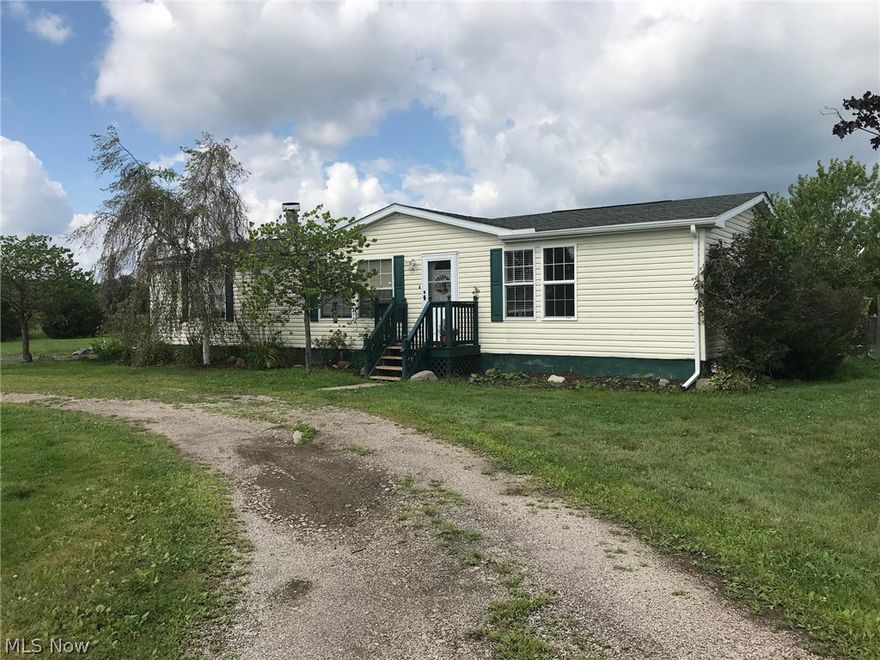 3 bedroom 2 bath ranch style modular/manufactured home set on 4.8+/- acres with a pond and a well. Seller will make home FHA/USDA compliant. U-shaped driveway and 2 storage sheds. The home offers vaulted ceilings, an eat-in kitchen with island, master bedroom, master bath, walk-in closets in all 3 bedrooms and a wood burning fireplace in the living. A few updates including the roof in 2015 & the gutters in fall of 2018.