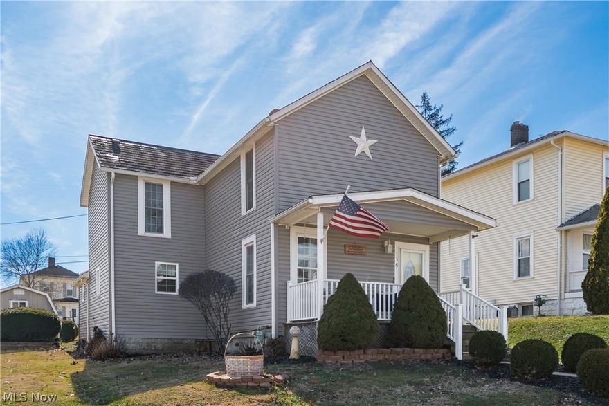 Welcome to this charming two-story home that blends comfort, convenience, and thoughtful updates throughout.

Step inside to a spacious main level featuring a cozy living room with a decorative fireplace and an open, inviting eat-in kitchen. Outfitted with stainless steel appliances and a convenient center island, the kitchen flows seamlessly into a generous dining area—perfect for everyday meals or hosting family and friends. A first-floor laundry room, complete with washer and dryer, along with a large full bath, adds to the home’s practical layout.

Upstairs, you’ll find three bright, comfortable bedrooms offering plenty of natural light and room to unwind.

Outdoor living is just as enjoyable, with a welcoming patio designed for entertaining and a covered front porch ideal for relaxing evenings. The property also includes two storage sheds, convenient rear parking, and additional street parking out front.

Recent improvements—new windows, vinyl siding, and updated flooring—enhance the home’s appeal and provide peace of mind.

This move-in-ready home is waiting for its next chapter. Schedule your private showing today.