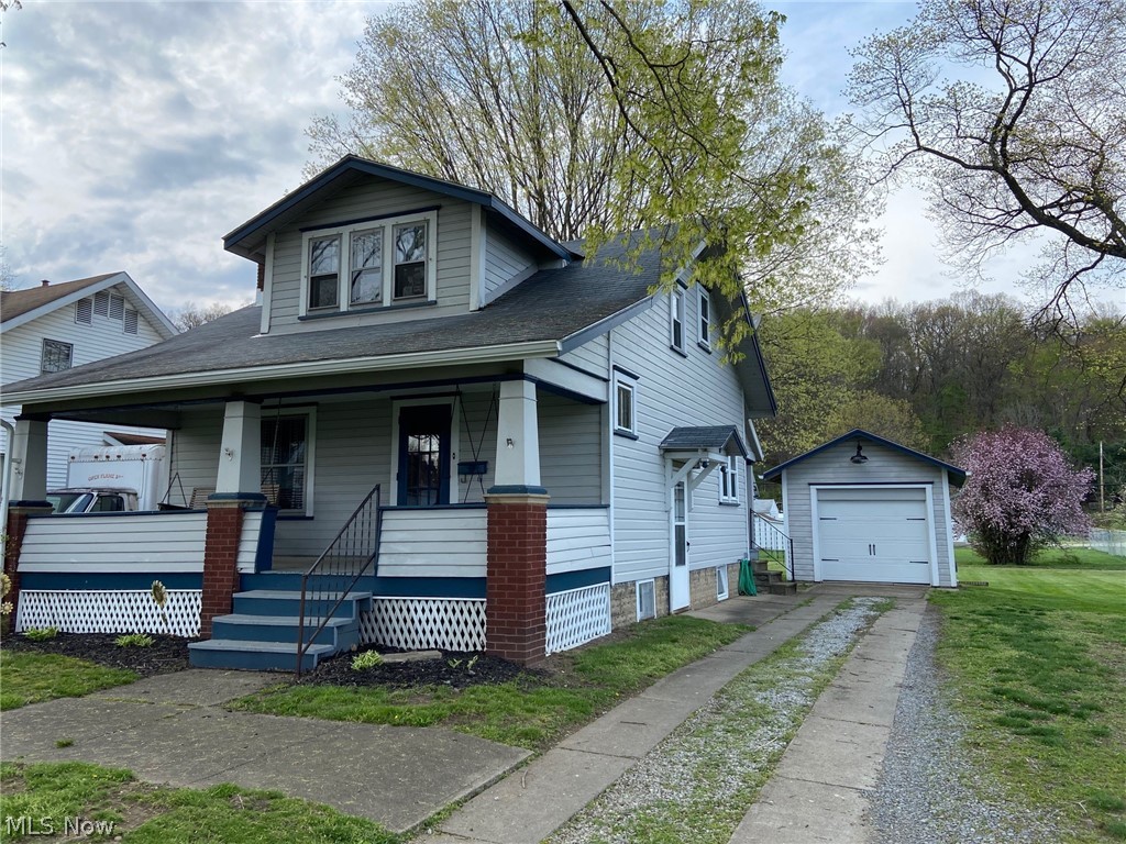 Move-in condition. Neat & clean. Updated flooring, electric, plumbing, some drywall. Newer bath. Oak kitchen, flooring, appliances approximately 6 yrs. old. Range, refrigerator, washer & dryer stay. Cozy living room has cosmetic fireplace, open stairway and original woodwork. Oversized dining room. Relaxing, deep covered front porch. Covered back porch overlooks deep alley-bound back yard. There is room for additional garages or off-street parking in the back. 1-car garage with newer garage door and opener. Exceptional lot (50X239). Home sits deep on the lot allowing for more privacy. Impeccably maintained. A breath of fresh air when you walk in. Won't last!