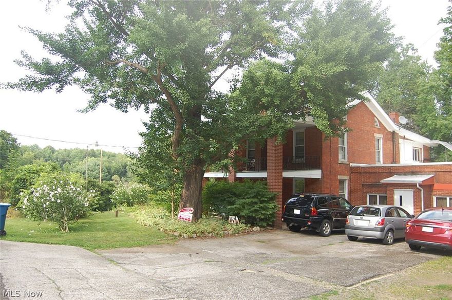 2.50 acres in Northwest School District. All brick colonial with a fire escape. Large yard for entertaining and bonfires. New septic (8yrs), New furnace and hot water tank approx. 8 yrs.