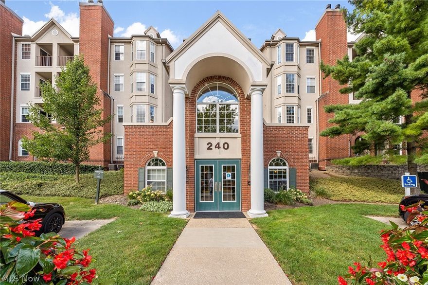 Fabulous opportunity to experience carefree living in this 2BD/2BA condo in one of Mayfield Heights' finest gated communities! You will be thrilled with the open floor plan that includes an eat-in with large bay windows and stainless appliances and opens to the dining/living room combo with wood burning fireplace and direct access to the large private balcony that can also be accessed through the second bedroom. Master suite has a walk-in closet and a newer ceiling fan. Unit also includes an in-suite washer/dryer, large hallway storage closet that conveys with the unit, heated attached parking garage with one assigned parking spot and 2 dedicated storage cabinets, and unlimited outdoor parking. Enjoy all the amenities that the Woodhawk community includes: 24-hour gated security, fitness center, clubhouse, 2 pools and tennis courts, outdoor picnic area with BBQ grills, and fitness room on ground level of unit building. Recent updates in unit include a newer hot water tank (~6 years), HVAC and thermostat (2018), and Window Nation windows and sliders (2015). All appliances are included. Close to freeway (1-271), Legacy Village and Beachwood Mall, and Hillcrest hospital. Not to be missed!