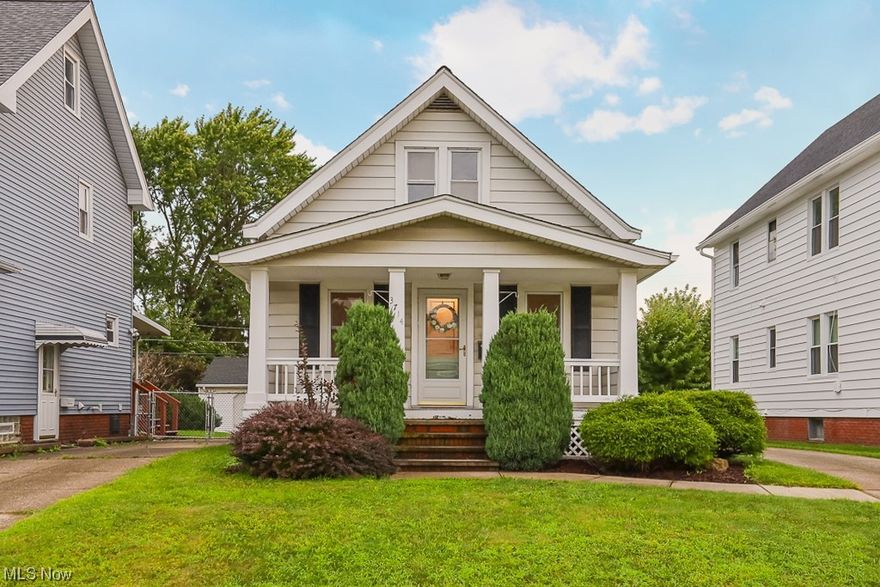 Nestled in a quaint Parma neighborhood, this charming bungalow exudes a timeless appeal with its classic design and delightful features. With two bedrooms, one bathroom and a formal dining room complete with built-in cabinets, this home offers a perfect blend of functionality and character. As you approach the house you are greeted by a picturesque front porch inviting you to sit and enjoy the peaceful surroundings. Upon entering you'll find the cozy, carpeted family room, followed by the formal dining room that features original hardwood floors. You'll love the touch of old world charm in the glass door knobs throughout the house. The first bedroom is on the main floor, as well as the full bath featuring a clawfoot tub. The kitchen is thoughtfully designed to maximize efficiency. It features modern appliances, sleek countertops, ample cabinet space and a walk in pantry, ensuring that all your culinary needs are met. A small mud room at the back entrance rounds out the first floor. The
