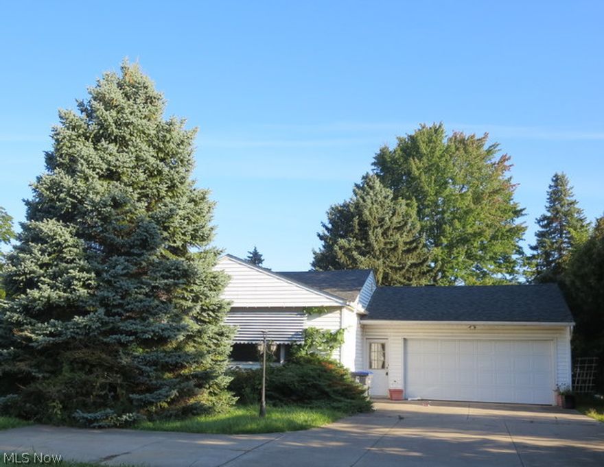 This property is a must see spacious  living area, with in law suite on a nice corner lot. Family room added off the dining room with fireplace. Partially finished basement with additional garage from lower level. Bring your paint brush needs some personal touch.  This is a Fannie Mae Home path property,