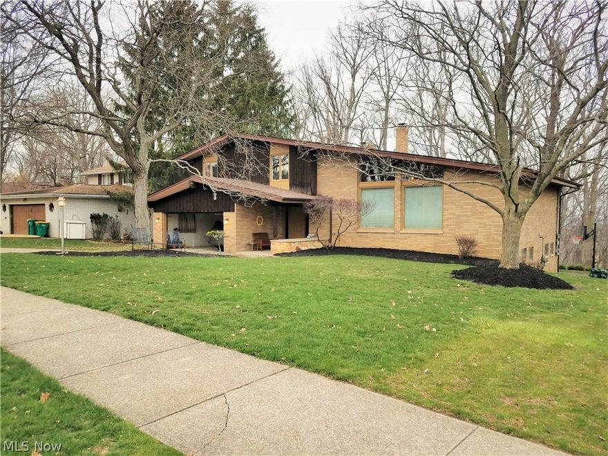 Come see this well thought out split level with spacious open floor plan on 1+acre overlooking beautiful scenic wooded lot. This 3,000 + square foot home is never ending. Large open spaces on main floor with recreation room and walk out in lower level leads you out to a spacious yard on this picturesque wooded lot.  Yard and outdoor space has something for everyone, from the large deck for grilling, to the in-ground basketball hoop, to the treehouse and tree swing for hours of fun for the kids. This home is built for entertaining inside and out with wide open spaces that flow from room to room, with all bedrooms on one floor, perfect for that young family.