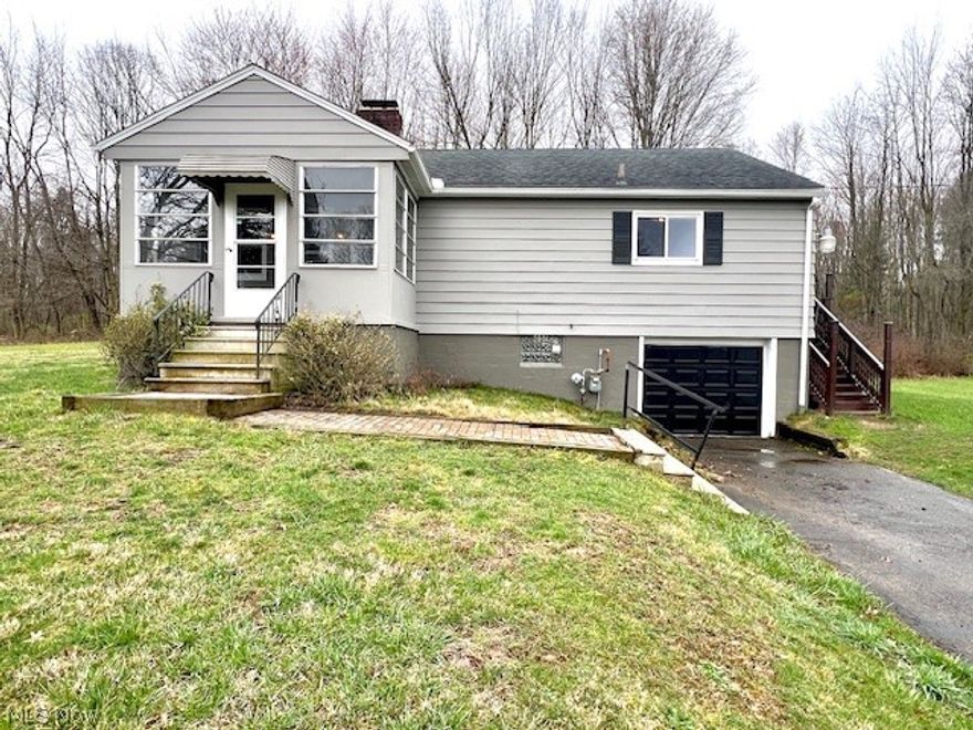 Welcome home to this updated ranch on over 1.5 acres in Norton! Many updates include a wrap around deck to enjoy the private yard surrounded by woods on a dead end street. Custom garage door, updated electrical panel, water softener, sump pump, hot water tank and septic system. Enclosed front porch and full basement with finished rec room featuring a fire place.