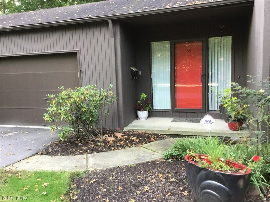 This spectacular professionally remodeled Bratenahl Townhome is located just across the street from Lake Erie! Features an open contemporary design and floor to ceiling windows for great natural light.  This exceptional home has three bedrooms and three full bathrooms each with its own unique ceramic tile design.  First floor features a two-story great room with a wet bar and fireplace, dining room, remodeled kitchen with stainless steel appliances, granite countertops and tiled back-splash and a full bathroom.   A floating staircase leads to the second floor which features the master suite with a Mediterranean design bathroom and a walk-out balcony overlooking a beautiful park-like setting.  Completing the 2nd floor is an open loft area perfect for a library or office and a second bedroom with double closets and the third full bathroom.  The fully finished lower-level features a living area and kitchenette that can be used as a rec room; also there is a third bedroom/guest suite, laun