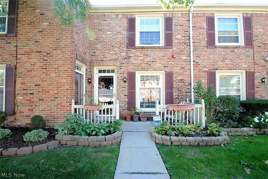 Absolutely fabulous & completely updated 2 story town house. Enter through the darling picket fence & lovely landscaping. Spacious living room has rich, hardwood which continues into the dining room & kitchen. The kitchen is fabulous with an abundance of quality cabinetry, stainless appliances and a breakfast bar & granite. There are updated sliding glass doors that lead to the deck & inviting outdoor space. The first floor guest powder room has been updated w/granite. Upstairs has neutral decor with full size STACKABLE washer/dryer, 2 large rooms & another completely updated stunning bathroom. This turn key condo has been renovated in today's decor. Georgetown condominiums are a gated community with an outstanding outdoor swimming pool, newly updated state of the art fitness center & party room and playground. This unit comes with a garage! Located minutes from freeway & very close to shopping, restaurants, hospitals, museums & universities. Condo free's include base cable. Home warra