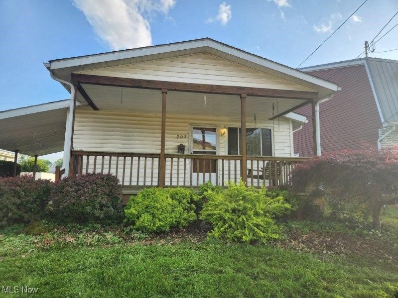 Motivated Seller Great Investment property or a starter home. Nice level backyard with alley access. Hardwood and vinyl throughout. Close to schools and shopping. With repairs this could be a great home. Being Sold "As Is".