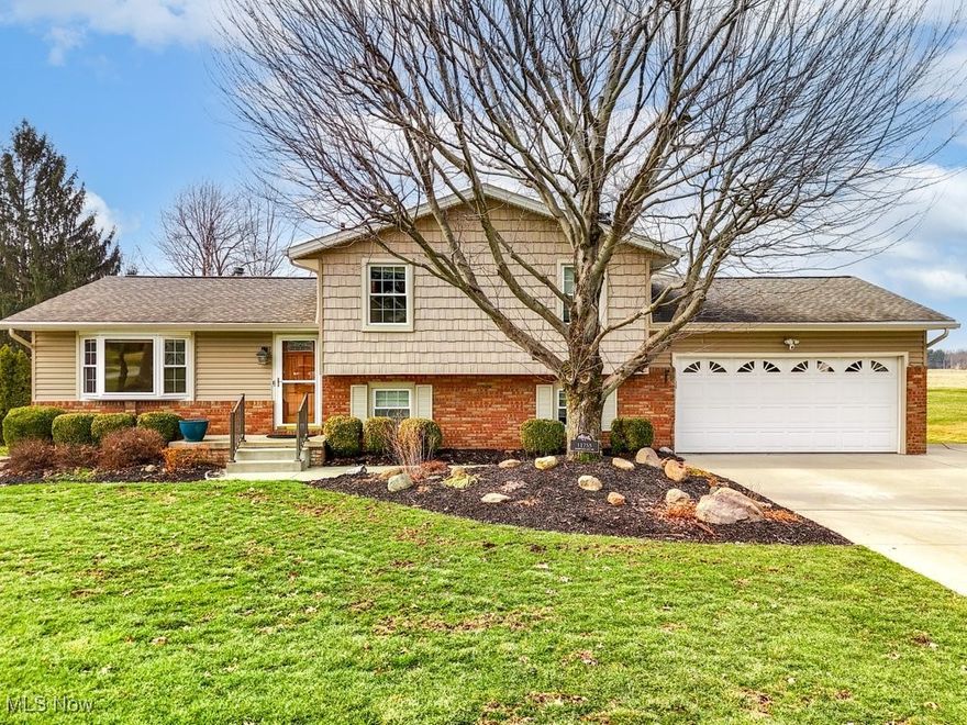 Welcome home! This is a rare opportunity to enjoy a meticulously maintained 4 bed/possible 5 bed with large private in-law suite! Located within Lake LSD, you will love the quiet surroundings and mature designed landscaping once spring hits! Home has MANY quality upgrades plus fresh paint and deep cleaning top to bottom. Split level design features 3 bedrooms on the upper level as well as full bath. Lower level on main house allows for 4th bed or private office off family room with fireplace. Large addition behind the garage holds 5th bedroom space, kitchenette, and full bath as well as work/live space. You will love the sunny three season room off the kitchen and composite deck (2020)! Large shed on property is only 3 years old with electricity ran to it. HVAC (2018), Roof (2014), windows (2017), septic regularly serviced, many interior updates within last 5 years and it shows! Many, many amenities are ready for you to love! This is a must see property!