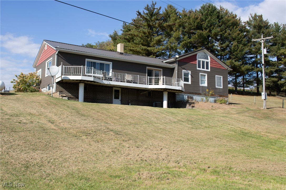 This property would be fantastic for anyone looking for a mini farm in the Ridgewood school district! With its expansive 40x60 garage/shop, heated floors, and the ability to house animals with the stalls and fenced-in pasture, it's certainly a mechanic's dream. The remodeled ranch-style home with large deck and plenty of yard offers the space for the whole family. Plus, the convenience of first-floor laundry and multiple heat sources make it comfortable year-round. Water source - spring-fed artesian well. Metal roof 2016, main bath 2016, vinyl siding 2020, tankless water heater 2021, mud room, bath and laundry 2019. Spectrum fiber is available for cable and Internet and a cell phone booster with antenna is also being left. There is a walk up attic to an unfinished space that could be made into a fourth bedroom.