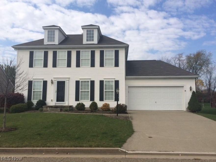 This home is in mint condition.  Great open floor plan.  There is a nice size great room with a gas fireplace.  Kitchen & dinette open into the great room.  Formal dining room, first floor laundry and three nice sized bedrooms upstairs.  Located right next to the Stark Parks trail.  Perfect to walk or ride to Gervasi.  All the walls in the home have also been insulated for sound.