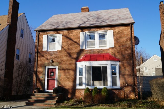 Sharp, All Brick Heights Colonial Near Everything!. Ready To Move In w/Fresh Decor & Hardwood Floors. Bright Living Room w/Bay Window & Fireplace. Dining Room Opens To Raised Back Porch...Great Place to Relax! Updated White Kitchen w/Nook. 3 Bedrooms On 2nd Plus Spacious 3rd Floor w/Fourth Bedroom. Lower Level Recreation Room w/Fireplace & Built-In Bar. Replacement Windows. Central Air. Quiet Dead-End Street. Take A Look!