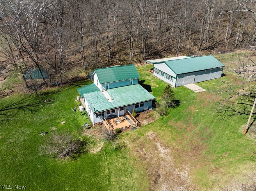 Live Auction 5/02/2026 10:00 AM - Combination Parcels 1-8  188 acres with over 4300' of road frontage -This exceptional 188-acre offering of Holmes County land presents a rare to the market opportunity to own real estate in the well-known Stillwell area. Located just seconds from a paved road, the land features an older ranch home, a 35' x 56' pole building, private septic, and a spring-fed water supply. The setting of the home offers peace and quiet, privacy, and ample land for gardening or animals. For the hunters, this property is situated in one of the county’s most sought-after hunting areas. Stillwell is well known for its hunting, and this property is no exception. Lots of deer trails, rubs, and scrapes, and each parcel is accessed from the east, providing favorable prevailing wind access and multiple ideal locations for food plots. A well-established trail system runs throughout the property, providing easy access. There is a nice ridgetop that spans most of the property, while the remainder of the land has a nice roll to it with a strong running creek, tons of road frontage, fenced pasture areas and ample building sites throughout. Most of the harvestable timber has already been marked and sold; these trees will be removed following the sale and are not included in the transfer. This selective harvest is expected to enhance the wildlife habitat and improve access with additional trails, bedding/cover, and browse. Whether you’re searching for a peaceful building site, prime hunting land, pasture ground, or just an investment, this property offers endless potential.