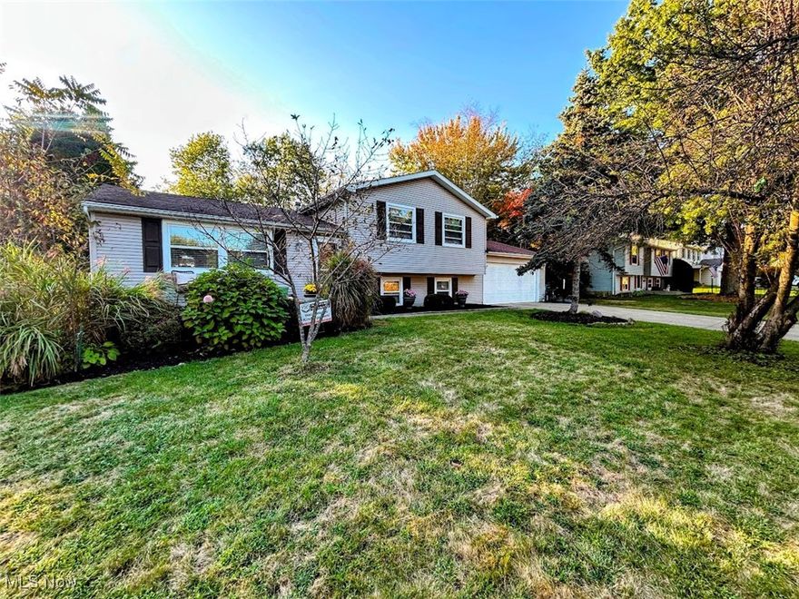 This is a one-of-a-kind home that you must see today!! Location, location, location! Only walking distance to a newly constructed Green Middle School, this retreat-like home will inspire you from the moment you walk in. Enjoy your summer breaks in a spacious, fully fenced, and wooded backyard. Close to 700 sq ft of light gray, spacious deck, surrounded by Tuscany-like pine trees, string lights, and a custom-designed stamped patio, this private oasis features an incredible setting by the pool. The interior of this gorgeous home resembles a beach house. The custom kitchen with island opens to the Dining Room and the Living Room, offering an open floor concept and inviting plenty of natural light. Lower-Level Family room features a whitewashed fireplace, above-grade windows, plush carpet, a Mud Room area with convenient access to a 2-car garage, and a full bathroom with custom glass shower, ceramic tile, and modern mirror and vanity. Upper-level features 3 bedrooms, 1 full bathroom, and a warm and cozy decor. Master bedroom overlooks the gorgeous pool setting. The landscaping in this bright home is immaculate. Enjoy your morning coffee on the cozy deck in front of the house and pick your apples from an apple tree. Backyard features a shed and a great space for some afternoon soccer practices. The kids' playset stays. The major new update is a brand-new energy-efficient furnace. The Listing Broker is related to the sellers.