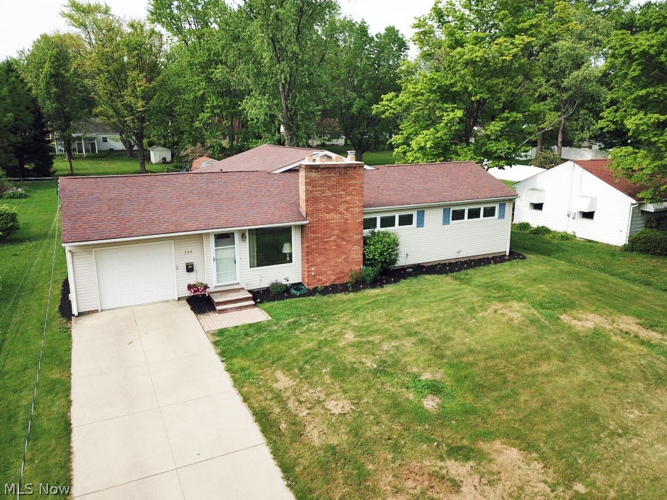 Lovely ranch with a beautiful, open kitchen and living room in Wadsworth! This home features four bedrooms, two full and one half bathrooms, a finished basement, and an attached garage. A brick fireplace sits next to the picture window in the living room. A sliding glass door off the kitchen leads to a lifted deck overlooking a spacious, flat backyard. This house also has a newer roof. Comes with America's Preferred Home Warranty! Don't miss out call today to schedule your private showing!