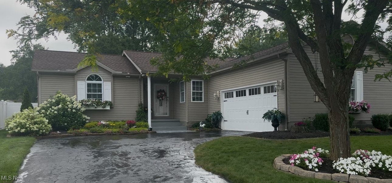 Discover 1995 Fox Chase, an exceptionally designed ranch home offering comfort and convenience in a prime neighborhood. Enjoy direct access to the Mill Creek bike and running path, including the peace of a no-through-traffic street.
Enter into a bright and open-concept floor plan. This main living area seamlessly connects the kitchen, dining room, and living room, all with a vaulted ceiling with charming wood beams. The focal point of the living room is a cozy Ben Franklin Wood Burning Stove, beautifully framed by a river stone accent wall. One laundry room is located on the main floor.
The spacious master bedroom is a private retreat complete with a full bathroom and a generous closet. On the other side of the home is a full guest bathroom, conveniently located adjacent to an incredible, customized built-in closet system that offers unparalleled organization and space. This space can be easily converted into 1 or 2 bedrooms.
The finished lower level is an extensive living space, with two additional bedrooms, a full bathroom, multiple closets, a second dedicated laundry room, a furnace room, and abundant storage possibilities.
Outdoor living is a dream in the serene, landscaped backyard, complete with a delightful fountain pond with fish. The back porch is covered by a premium Purple Leaf 12' x 20' White Aluminum Louvered Pergola Rain roof with its gutter system, ensuring comfort in any weather. An 8' x 12' shed offers additional utility. Don't miss the opportunity to own this unique property with a 2-car oversized attached garage. The roof is approximately 6 years old, a new hot water tank, light fixtures, and a garage door. The sump pump has a battery backup. Completely updated, well-maintained home. All appliances stay! Don't miss out on this one!