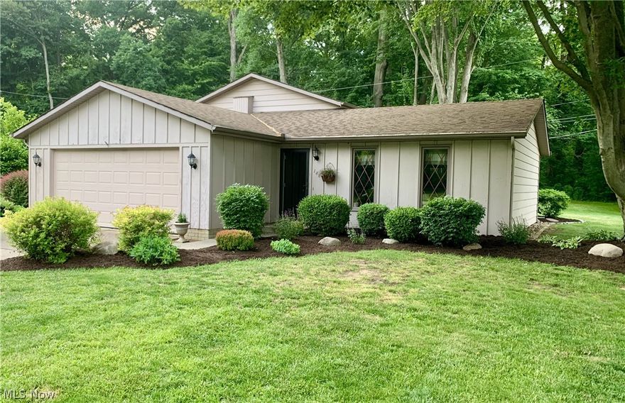Welcome to this carefree split ranch style home! Enter into the light filled living room with soft wall to wall carpeting and neutral decor. The well equipped kitchen has stainless steel appliances including the refrigerator, dishwasher and electric range. A sunny casual dining area has a sliding glass door to the patio and yard. Step down to the comfortable family room with a cozy fireplace and additional office space or hobby room. A full bathroom and laundry are found on this level as well. Upstairs, three bedrooms have neutral decor, wall to wall carpeting and share the hall bathroom. Situated on a quiet tree lined street, this home is the perfect starter home and is also ideal for downsizing. Welcome Home!