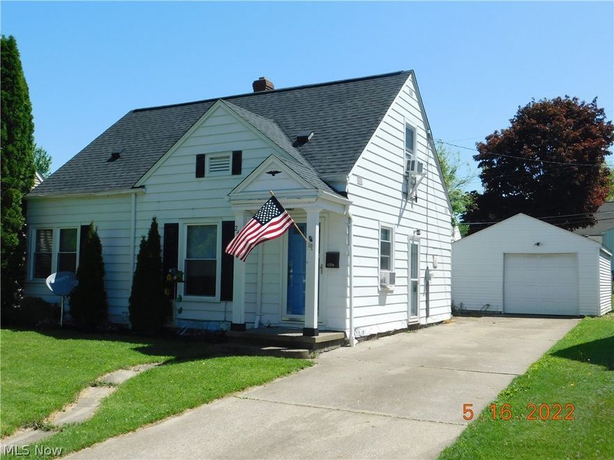 Ready to enjoy all that Cuyahoga Falls offers at a great price and a wonderful neighborhood.  This adorable cape has been freshly painted, new laminate flooring, an upgraded 3 dimensional roof and windows throughout.  It was a 3 bedroom home, and the previous owners opened a wall to create a formal dining area or extended living room.  The basement offers lots of storage or could be a useful entertainment area with some TLC.    Fenced in backyard, storage shed and patio area and a sunny area for a garden.
