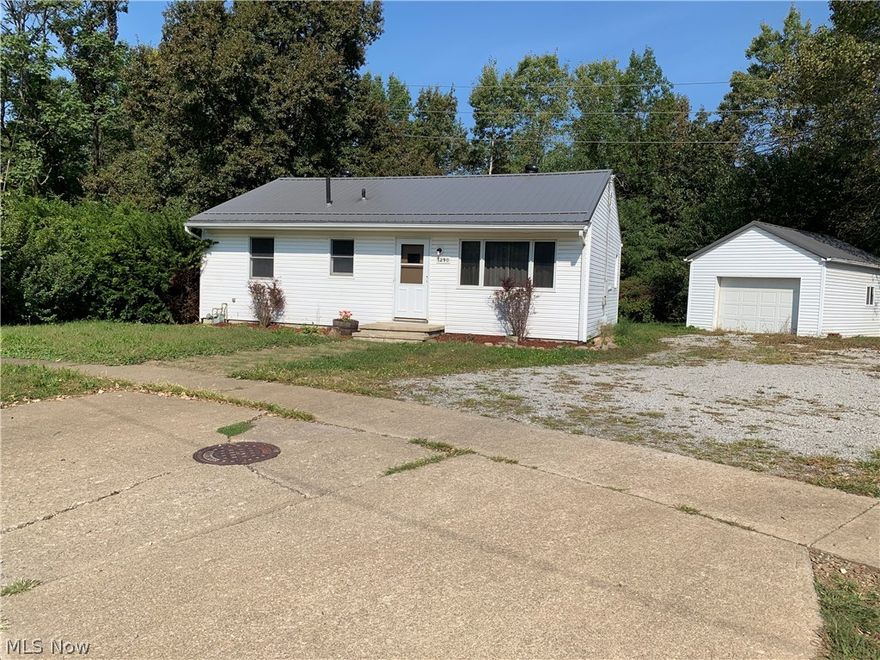 This nice 2 bedroom, 1 bath home has more room than you would expect. The spacious kitchen and bathroom have both been tastefully renovated and many of the rooms have carefree laminate flooring. The full basement provides plenty of room for storage or added living space. Out back, there is a nice deck and yard and there's plenty of room for parking including a one car garage. You'll enjoy the convenience of the easy, open floor plan. All appliances stay including washer and dryer. Come make this house your home!