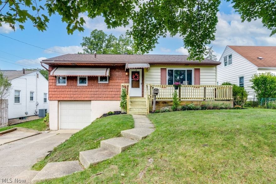 Delightfully remodeled 3BD/1BA Raised Ranch with several big-ticket improvements throughout! Enjoy an updated bath (2013), neutral paint, refurbished hardwood floors in the bright and airy living room, and newer carpeting. The eat-in kitchen with banquet area has been beautifully updated with custom cabinetry, Corian countertops, and stainless appliances (dishwasher 2022). A partially finished basement features an inviting family room, perfect for entertaining. The remodeled laundry area has newer vinyl flooring, washer/dryer (only 5 yrs old and included in sale!), and features a kitchenette area with a full sink and cabinets and can easily accommodate a full fridge or freezer. Extra storage is available in the unfinished utility room with newer H2O heater and humidifier (2016) and HVAC. The attached garage has a roomy and convenient entry that could double as a mudroom. Looking for a great outdoor living space? This home does not disappoint with its inviting deck overlooking the large