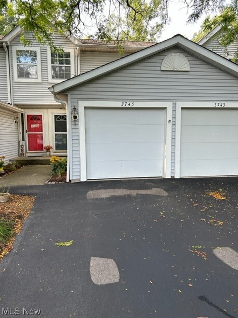 Well taken care of Townhouse in a great location of Stow. The condo has 2 Bedrooms and 2 1/2 Bathrooms with neutral colors throughout. The kitchen is white, bright, and clean. All of the appliances stay with the townhouse, as well as, the washer and dryer. Off of the living room area on the main floor are sliding glass doors that go out to a deck and off of the lower walk family room area is a concrete patio. The laundry room is located in the lower level of the townhouse. The townhouse comes with a one-car attached garage, perfect for those brisk winter days. There is also ample parking right by the townhouse, as well as, close to shopping and restaurants. Don't miss this opportunity to own this beautiful townhouse that backs up to the woods for ultimate privacy.