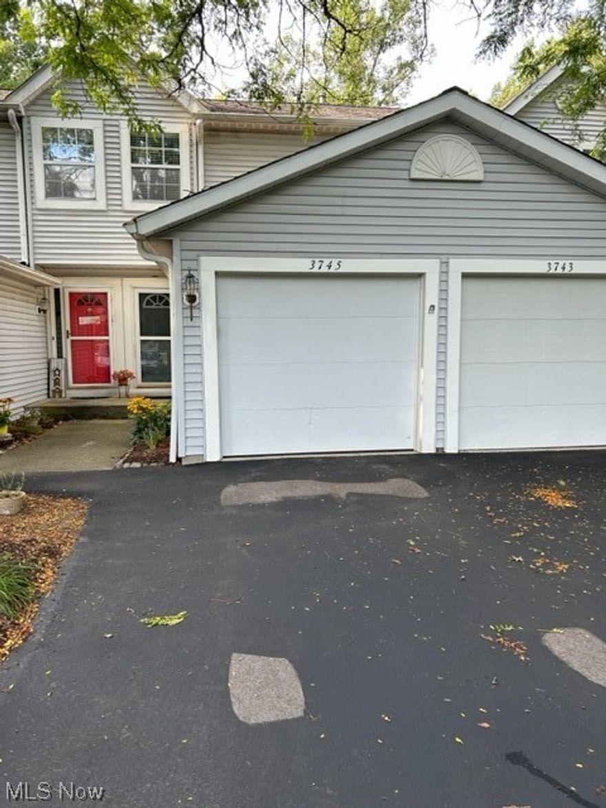 Well taken care of Townhouse in a great location of Stow.  The condo has 2 Bedrooms and 2 1/2 Bathrooms with neutral colors throughout.  The kitchen is white, bright, and clean.  All of the appliances stay with the townhouse, as well as, the washer and dryer.  Off of the living room area on the main floor are sliding glass doors that go out to a deck and off of the lower walk family room area is a concrete patio.  The laundry room is located in the lower level of the townhouse. The townhouse comes with a one-car attached garage, perfect for those brisk winter days.  There is also ample parking right by the townhouse, as well as, close to shopping and restaurants. Don't miss this opportunity to own this beautiful townhouse that backs up to the woods for ultimate privacy.