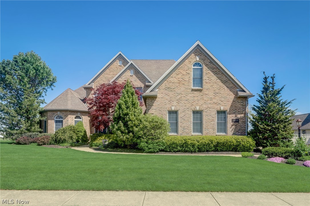 Stunning custom-built home in Huron just minutes from Lake Erie, beaches, marinas, and more! Every inch of this home exudes elegance and attention to detail. You'll love the Chef's Kitchen with stainless appliances, granite counters, and walk-in pantry. The Great Room features a cathedral ceiling and a grand fireplace, creating the perfect ambiance for family gatherings and cozy evenings. The first-floor Owner's Suite is a sanctuary unto itself, complete with two walk-in closets, a cozy sitting area, and a luxurious spa-like bath featuring dual granite vanities and a rejuvenating soaking tub. Another first-floor bedroom, tucked away for privacy, serves as an ideal Guest Suite with its own private bath. Upstairs, two spacious bedrooms, a full bath, a loft landing, an office offer ample space and versatility. Enjoy outdoor living with a huge walk-out basement, deck, and patio overlooking the large private backyard. An over-sized 3 car garage is a bonus! *Seller is listing agent.