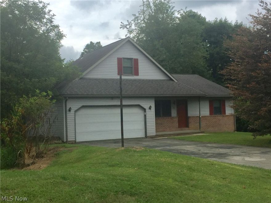 Ready to add your own personal touches! This beautiful home has spacious Living rm open to dining area w/French doors leading to wood deck overlooking woods and creek. Kitchen features oak cabinets w/updated granite countertops. Upstairs has large master bdr with full bath. Basement is finished with new carpet ,drywall and paint within the last year. Bsmt includes laundry room, family room and two additional rooms which could be used as bedrms, office, or exercise room. Family room exits to private back yard. This Property extends to other side of creek.