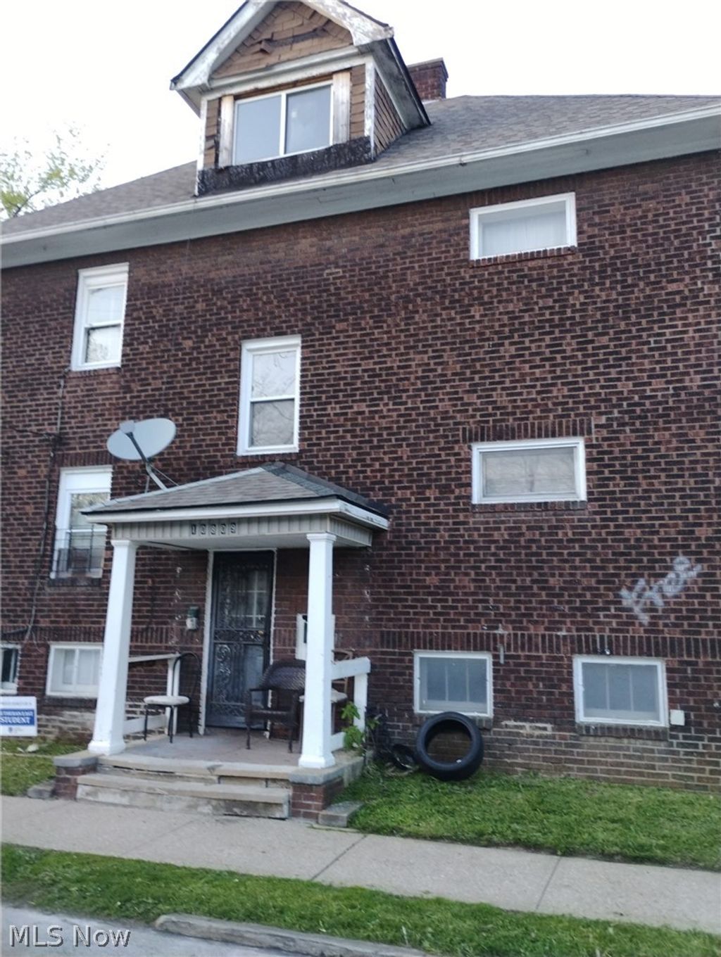 Photo of 10809 Woodstock Boulevard, Cleveland, OH 44104 (MLS # 5204552)